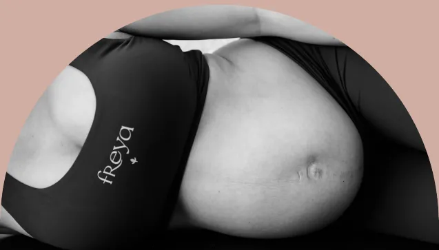 Pregnant women laying on her side