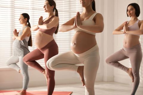 Pregnant women doing yoga